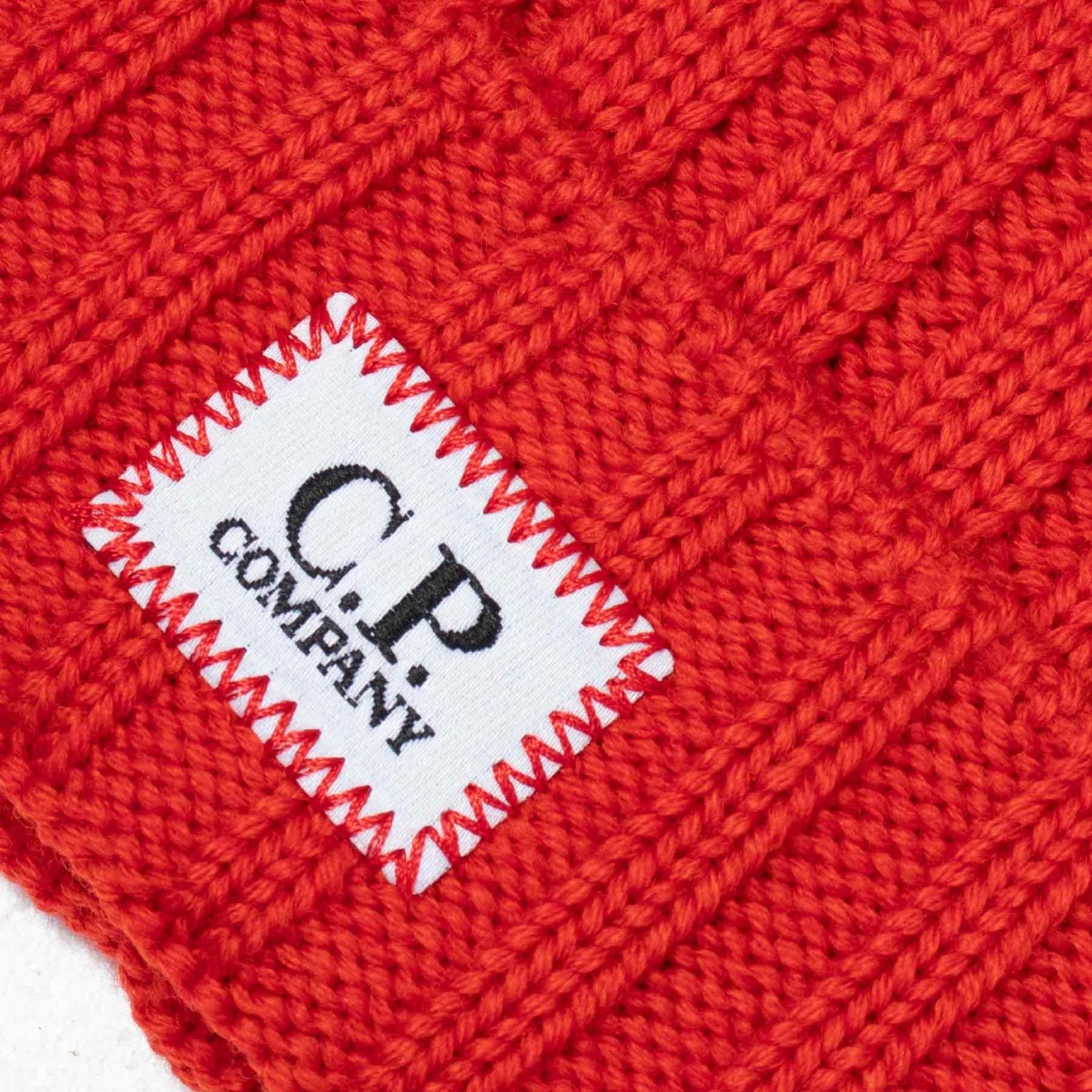 C.P. Company CMAC120A Patch Logo Beanie - 486 Pompeian Red - Escape Menswear